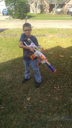 boy playing with nerf gun