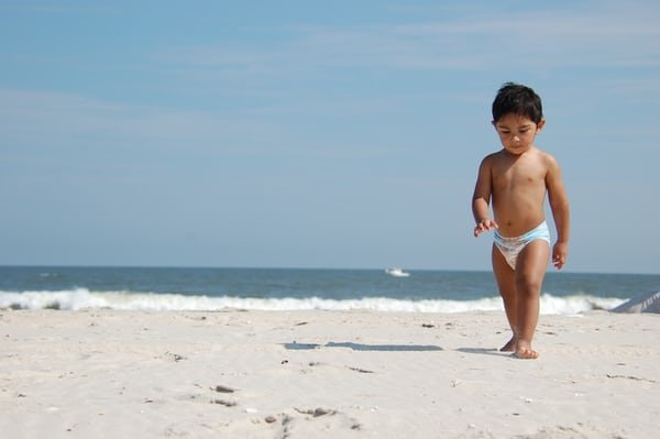 boy walk beach