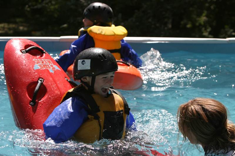 Kid Kayaking in Pool